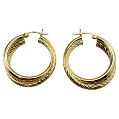 Boucles d'oreilles à double anneau en or jaune 14 carats