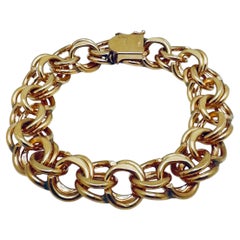 Armband aus 14-Karat-Gelbgold mit Doppelgliedern und Anhängern, 7,5 Zoll lang, 58,9 Gramm