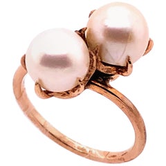 Anillo de Oro Amarillo de 14 Kilates con Doble Perla