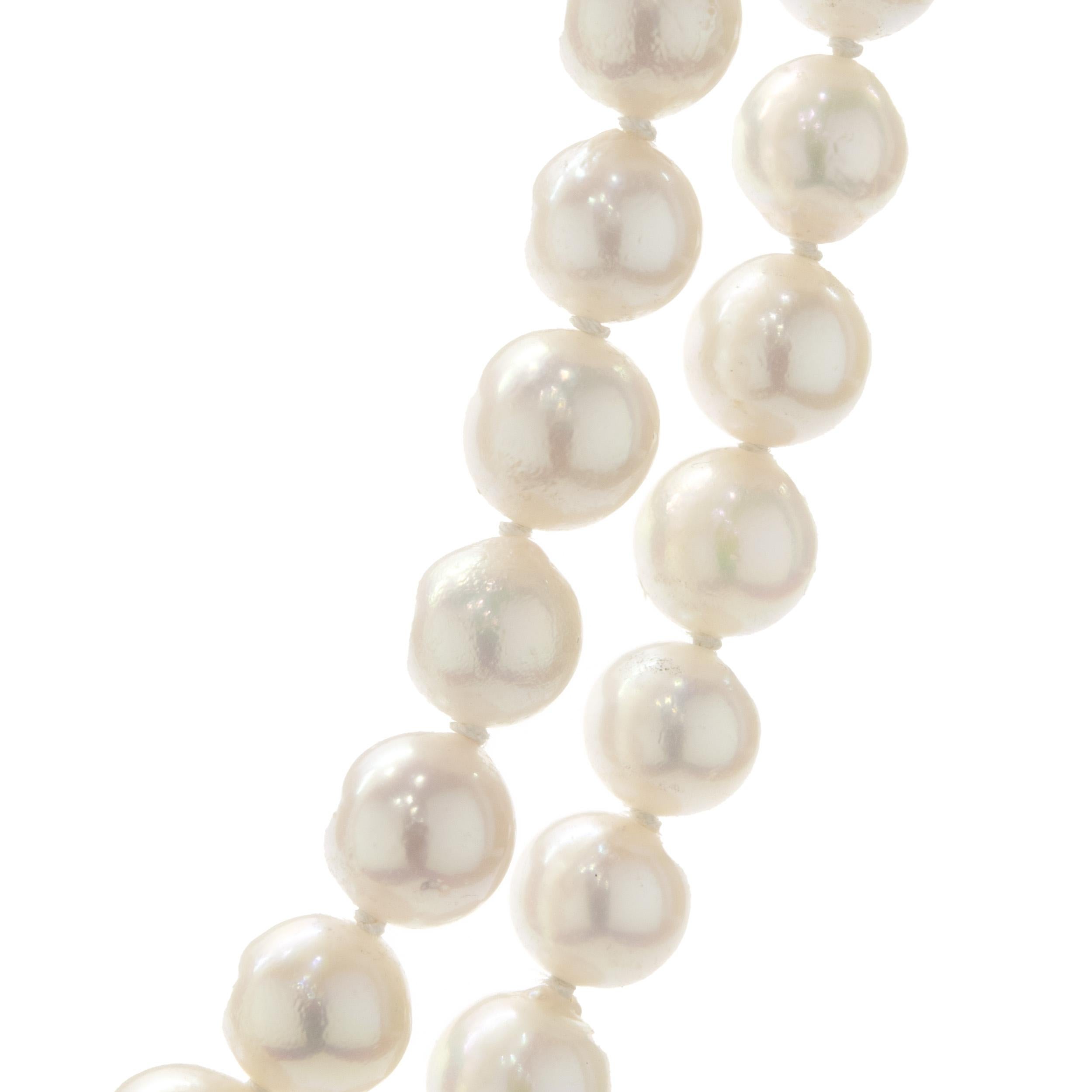Designer: Custom
Material: 14K yellow gold
Diamonds: 19 round cut = .30cttw
Color: G
Clarity: VS
Pearl: 7mm semi-round Ivory pearls
Dimensions: necklace measures 16-inches in length
Weight: 57.00 grams
