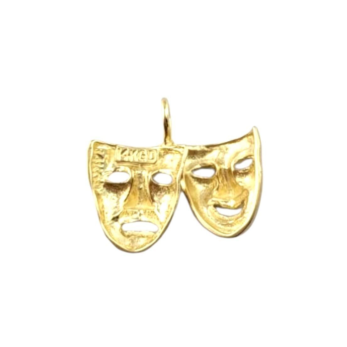 Ciondolo Drama in oro giallo 14K

Questo ciondolo Drama in oro giallo 14K presenta un design audace e artistico, che cattura l'essenza dell'espressione teatrale. La finitura in oro lucido mette in risalto la forma unica e drammatica del ciondolo,