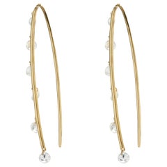 14 Karat Yellow Gold Drilled Diamond Drop Earrings