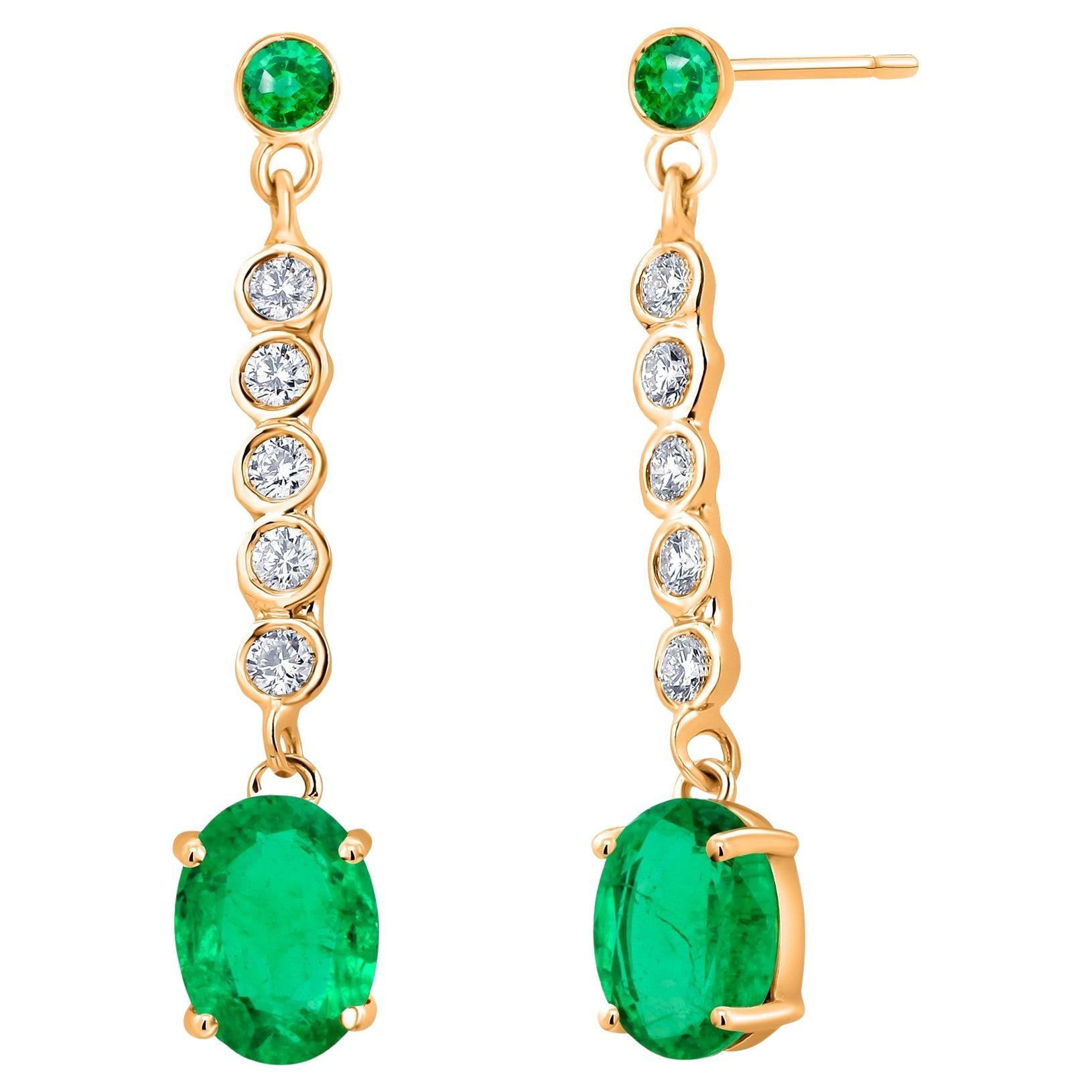 14 Karat Yellow Gold Drop Earrings with Emeralds and Diamonds 1.15 Inch Long