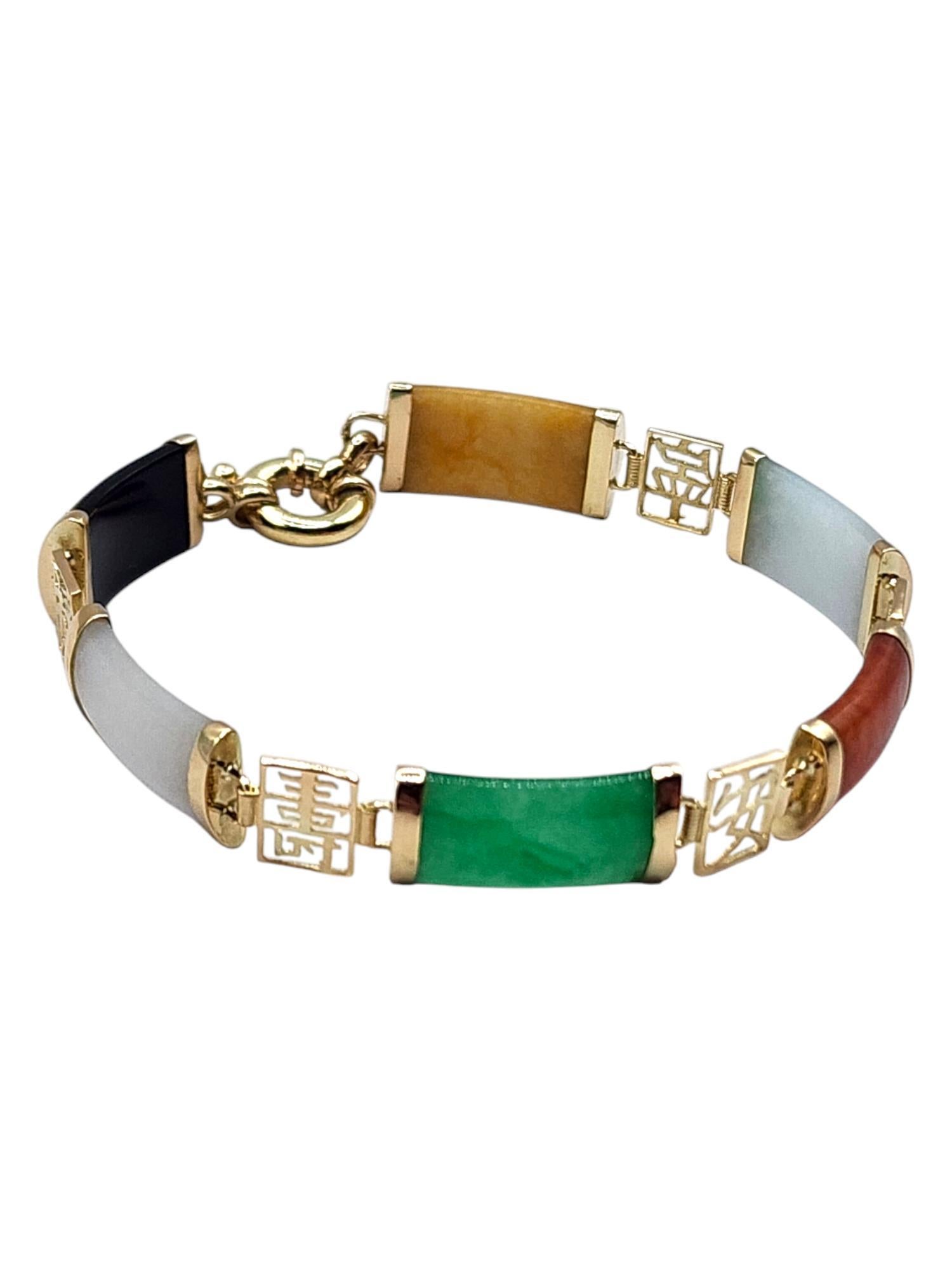 Bracelet en or jaune 14 carats teinté de jade multicolore

Ce magnifique bracelet présente des pierres de jade teintées multicolores serties dans de l'or jaune 14 carats pour une finition magnifique !

Taille : 7