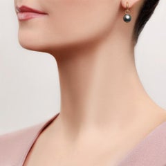 14 Karat Yellow Gold Earrings with Free Moving Dark Tahitian Pearl