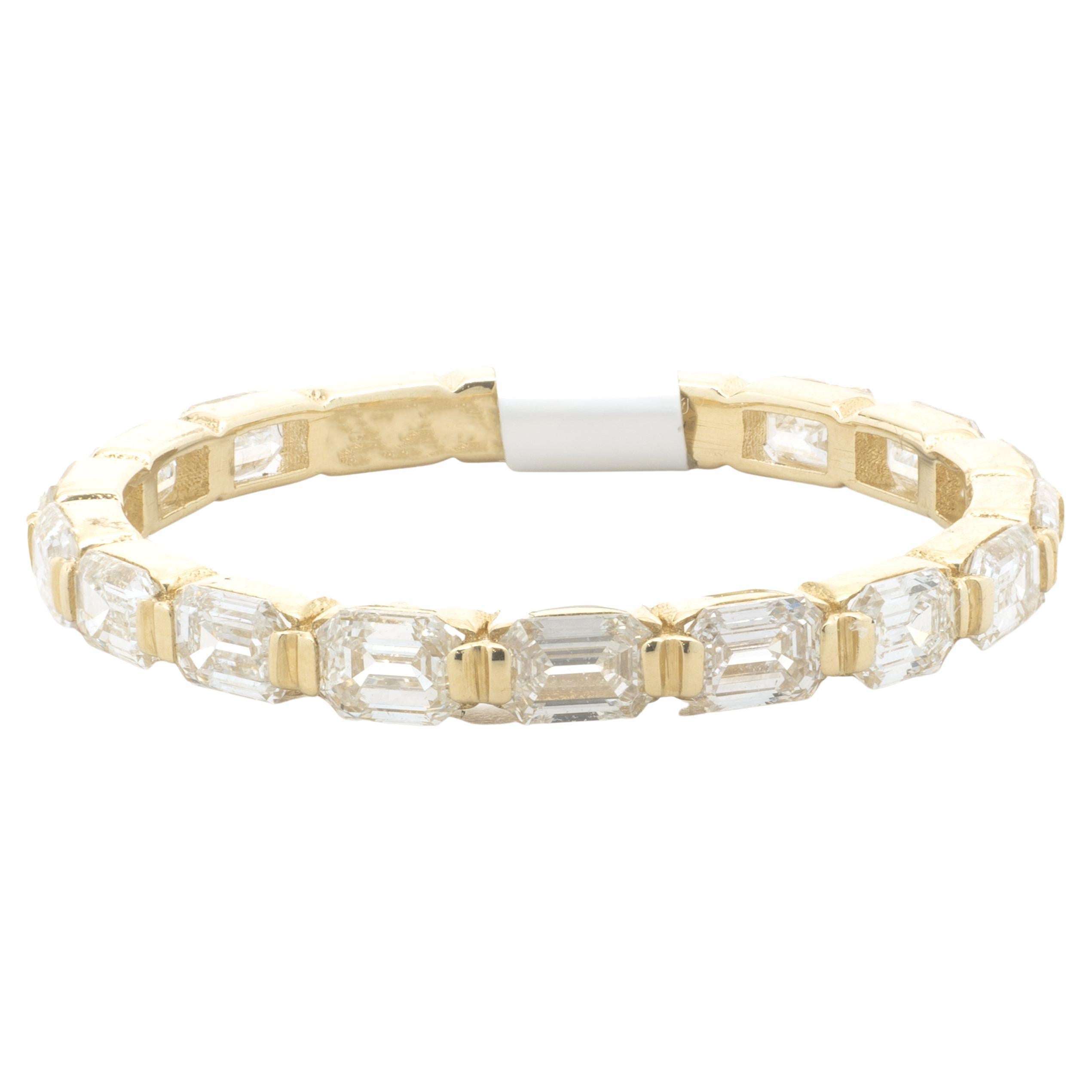 Bracelet en or jaune 14 carats avec diamants taille émeraude Est-Ouest