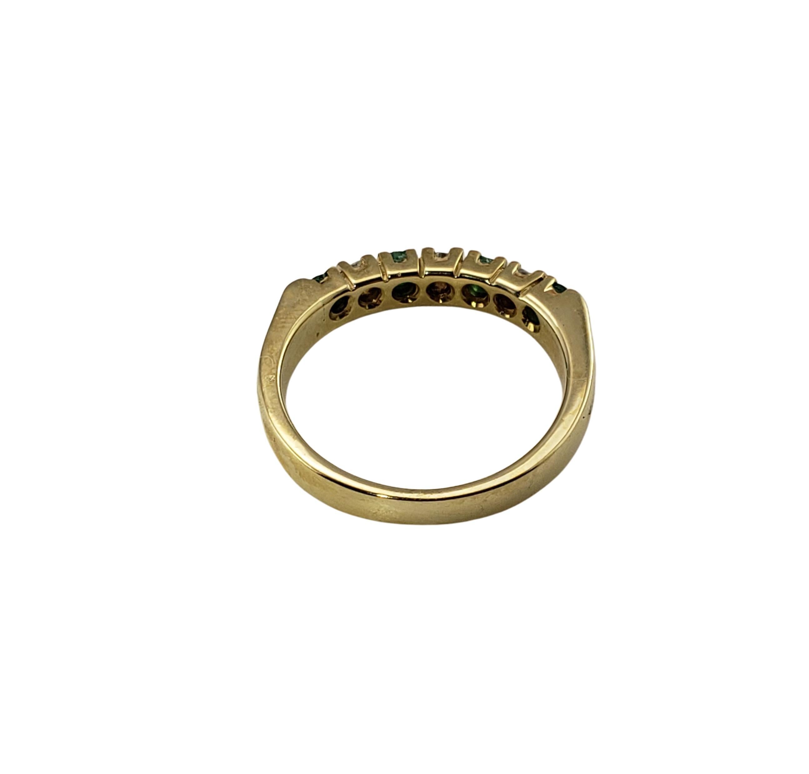 Women's 14 Karat Yellow Gold Emerald and Diamond Band Ring