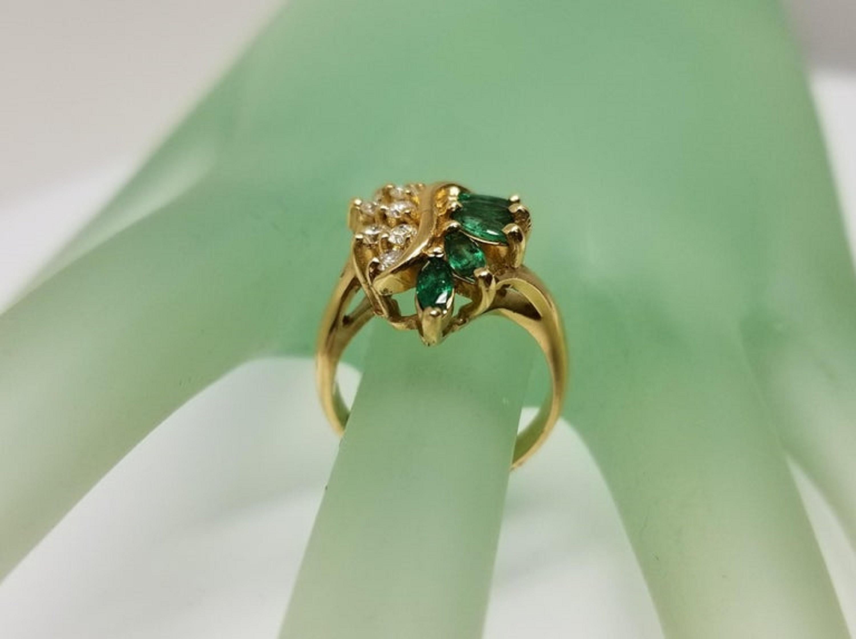 14 Karat Yellow Gold Emerald and Diamond Cluster Ring For Sale 1