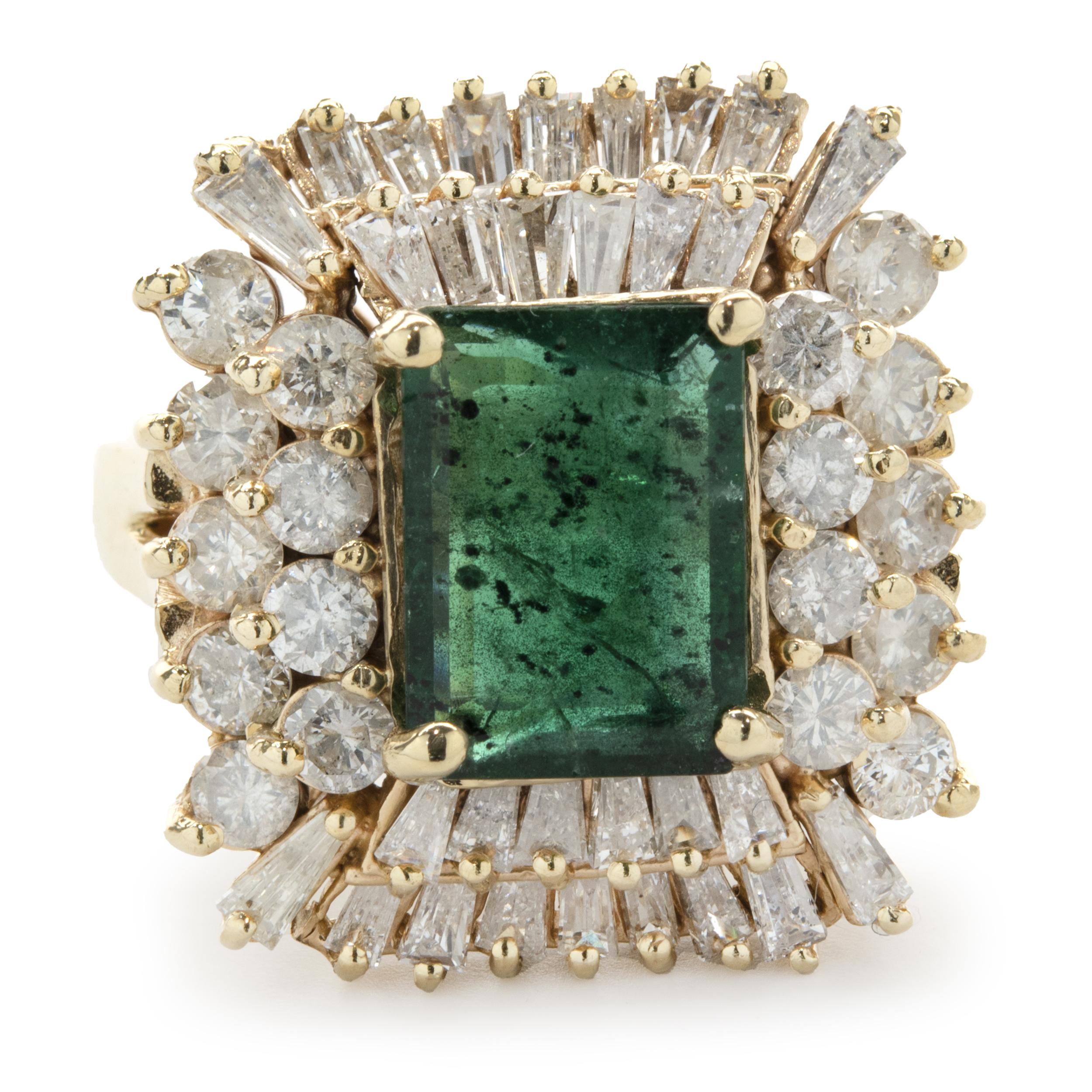 Designer: custom
Material: 14K yellow gold
Diamond: 32 round and baguette cut = 1.54cttw
Color: G
Clarity: SI1
Emerald: 1 emerald cut = 3.00ct
Dimensions: ring top measures 21mm
Ring Size: 7 (complimentary sizing available)
Weight: 11.42 grams