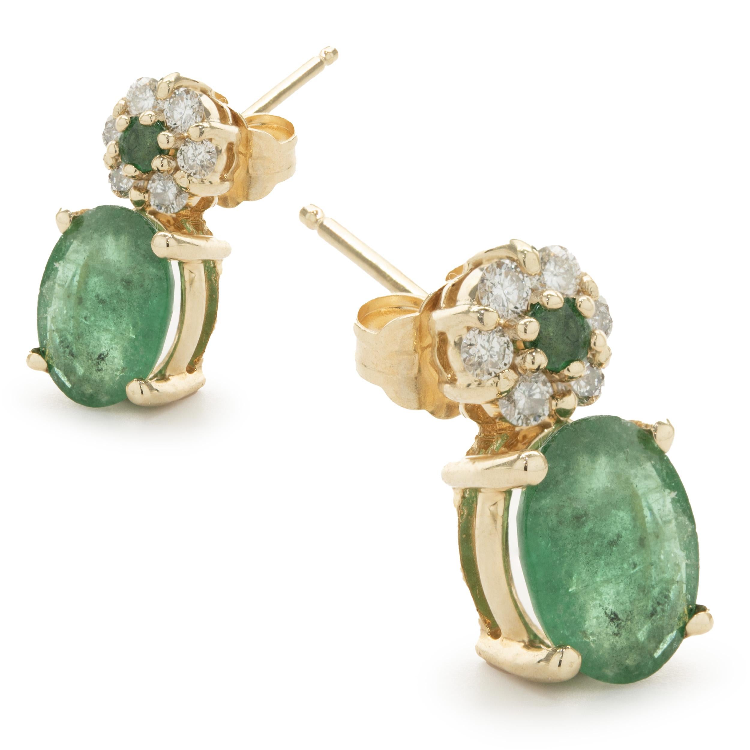 Designer: custom
Material: 14K yellow gold
Diamond: 12 round brilliant cut = 0.25cttw
Color: G
Clarity: SI1
Emerald: 2 oval cut = 2.80cttw
Dimensions: earrings measure 13.80mm in length 
Fastenings: friction backs
Weight: 2.90 grams