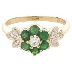 Blumenring aus 14 Karat Gelbgold mit Smaragd und Diamant