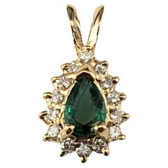 14 Karat Yellow Gold Emerald and Diamond Pendant #17216