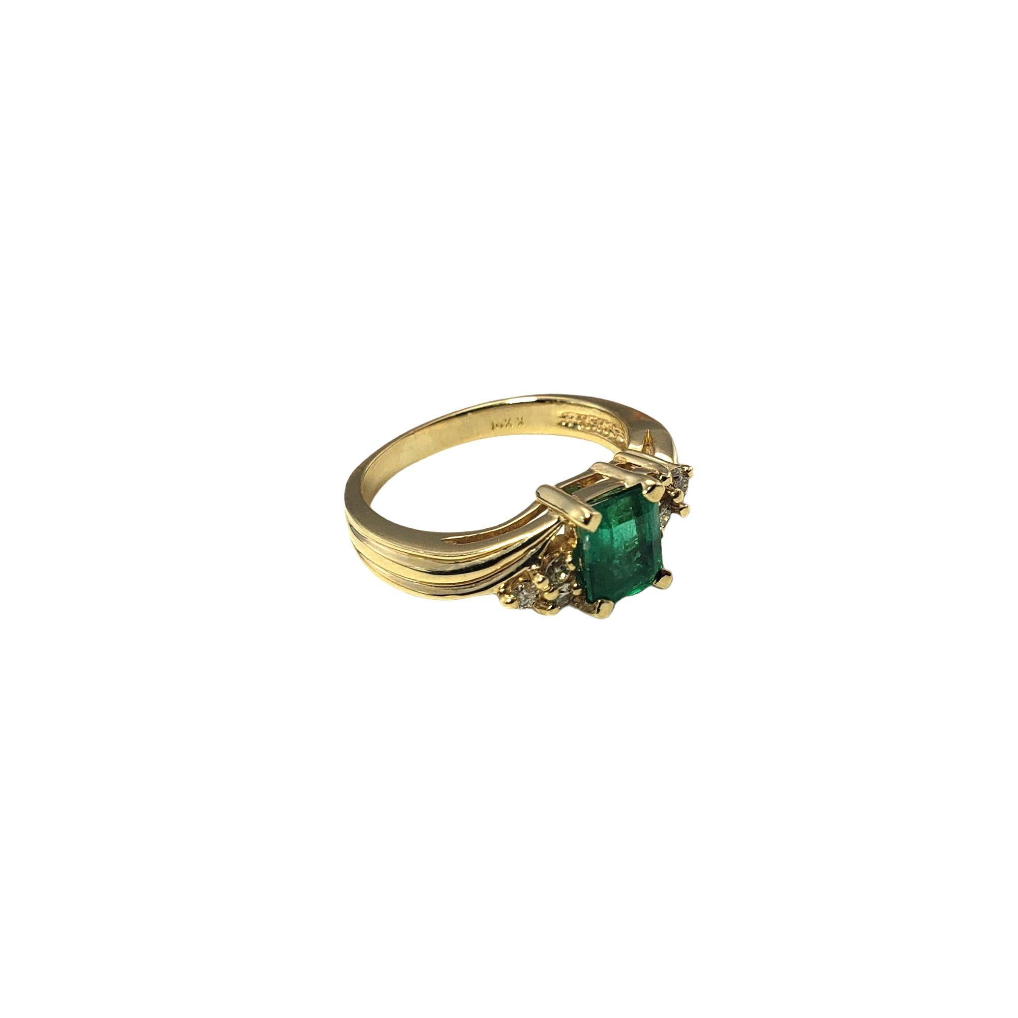 Vintage 14 Karat Yellow Gold Emerald and Diamond Ring Size 5

This stunning ring features one emerald (6 mm x 5 mm) and six round brilliant cut diamonds set in classic 14K yellow gold.
Shank: 2 mm.

Approximate total diamond weight: .10 ct.

Diamond