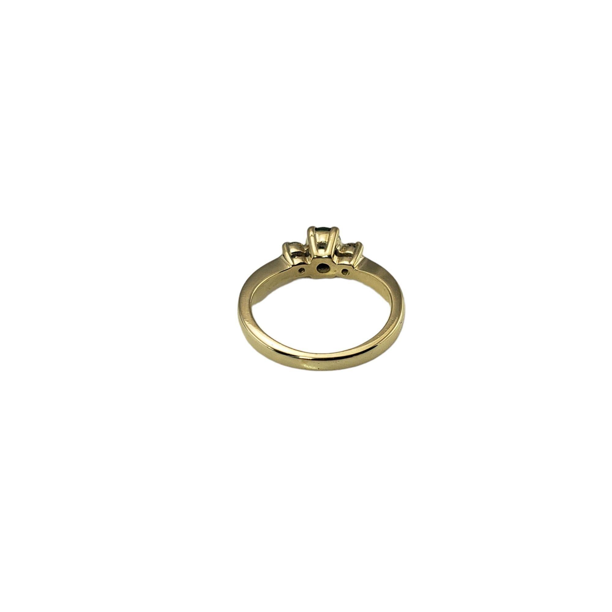 Round Cut 14 Karat Yellow Gold Emerald and Diamond Ring For Sale