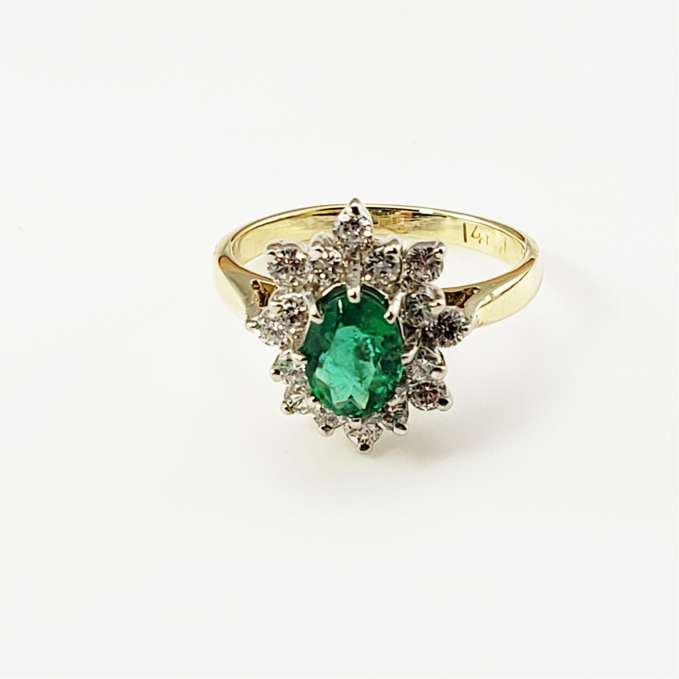 14 Karat Yellow Gold Emerald and Diamond Ring Size 5.75 GAI Certified-

This stunning ring features one oval emerald (7 mm x 5 mm) surrounded by 16 round brilliant cut diamonds set in classic 14K yellow gold.  Shank: 1.5 mm.

Emerald carat weight: 