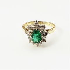 14 Karat Yellow Gold Emerald and Diamond Ring