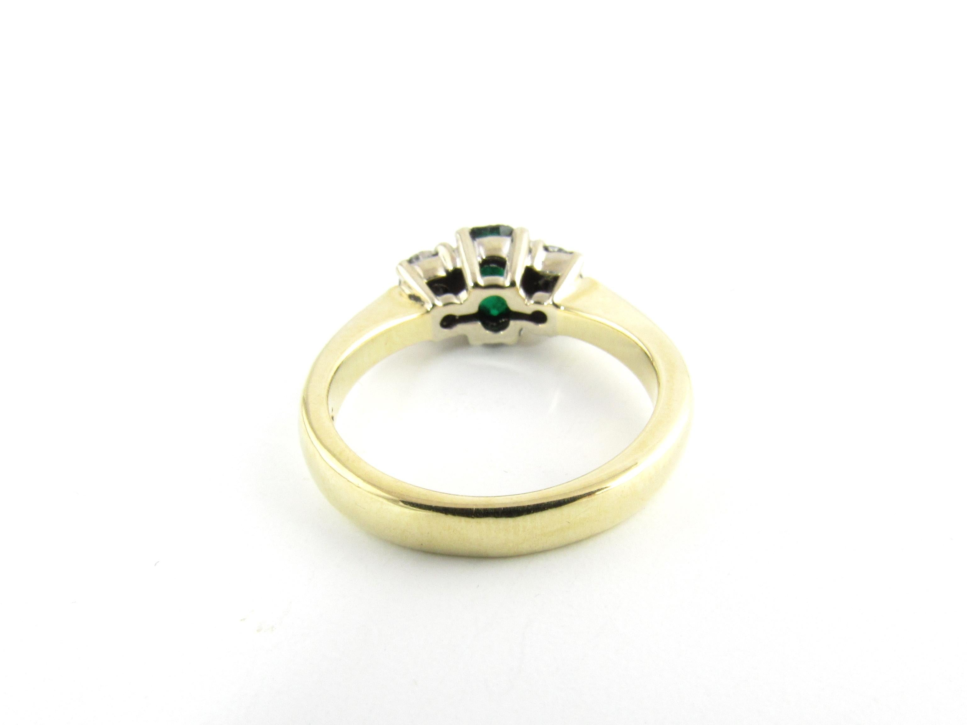 Oval Cut 14 Karat Yellow Gold Natural Emerald and Diamond Ring