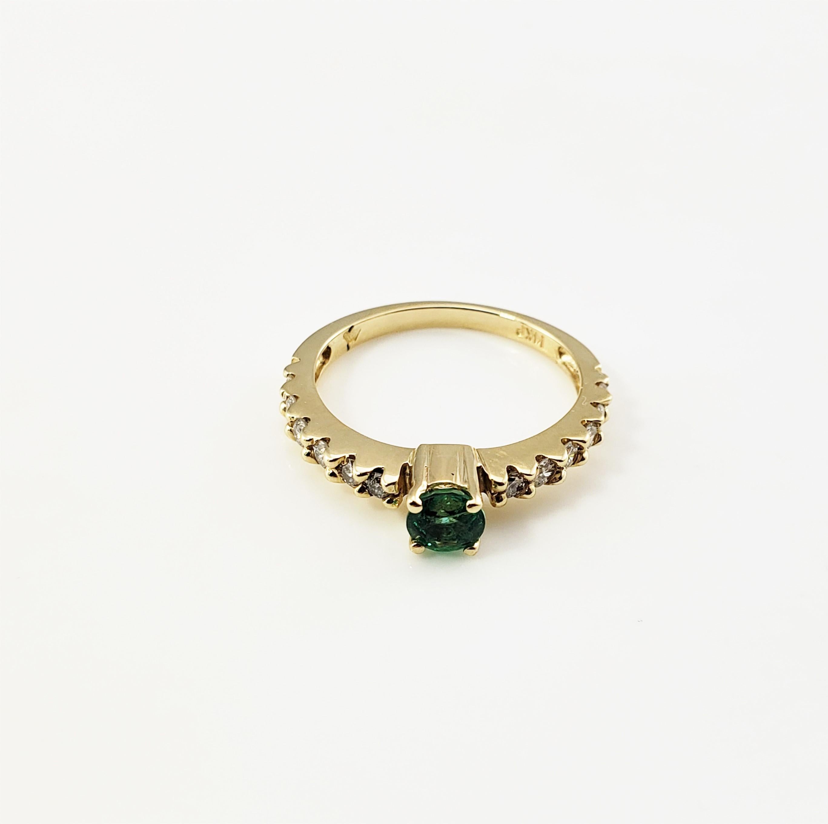 14 Karat Yellow Gold Emerald and Diamond Ring Size 6.75-

This lovely ring features one round emerald (5 mm) and 12 round brilliant cut diamonds set in classic 14K yellow gold.  Shank: 1.5 mm.

Approximate total diamond weight:  .36 ct.

Diamond