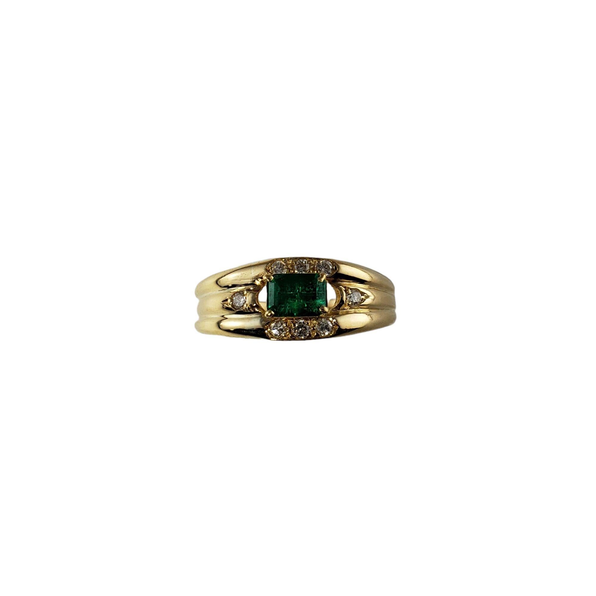 Vintage 14 Karat Yellow Gold Emerald and Diamond Ring Size 6.5-6.75

This elegant ring features one emerald gemstone (6 mm x 4 mm) and eight round brilliant cut diamonds set in classic 14K yellow gold. Width: 8 mm. Shank: 2.5 mm.

Approximate total