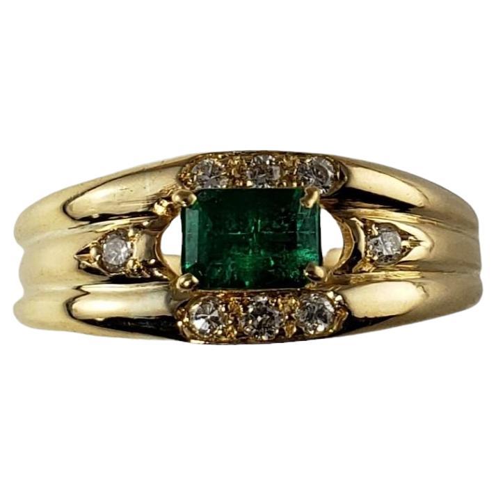 14 Karat Yellow Gold Emerald and Diamond Ring For Sale