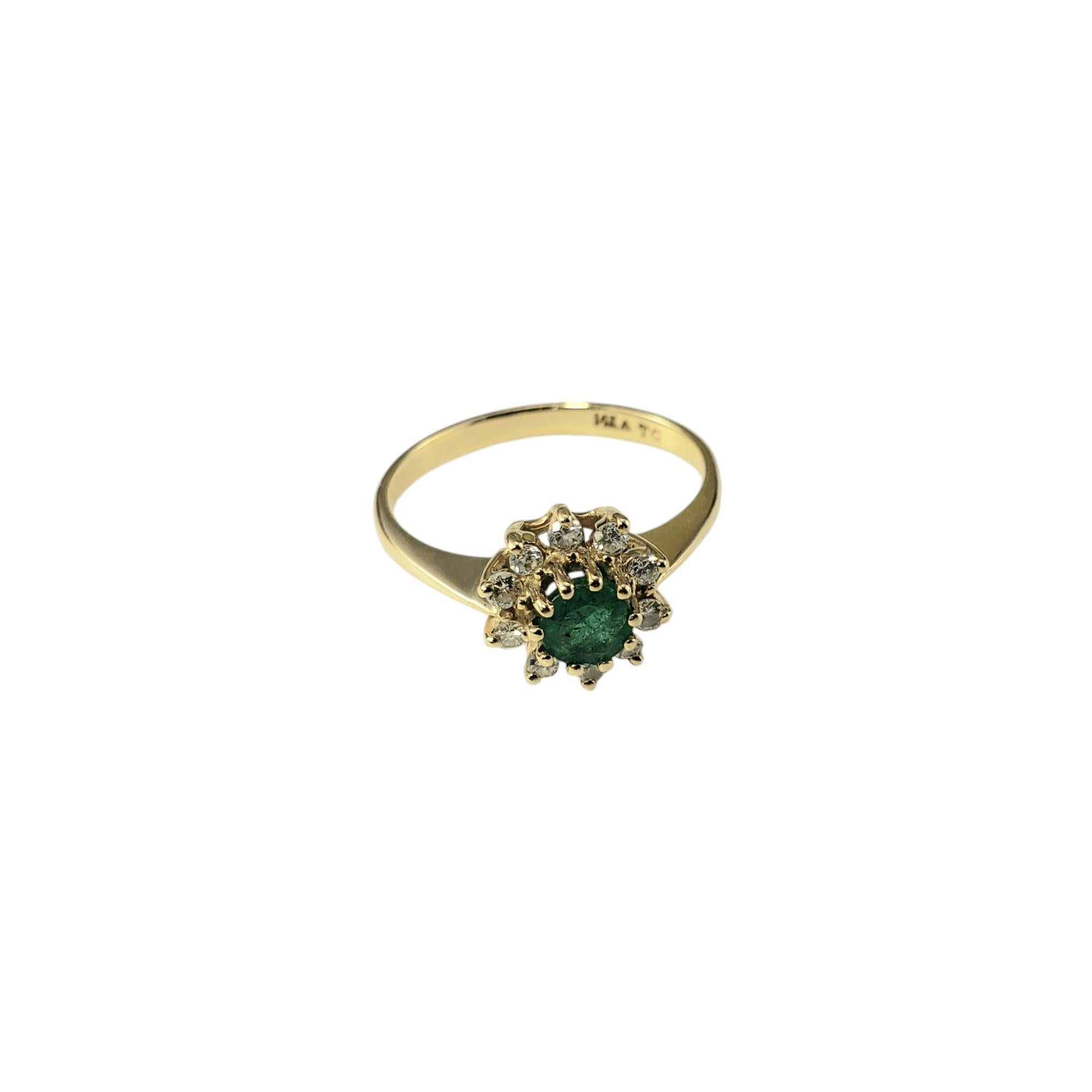 14 Karat Yellow Gold Emerald and Diamond Ring Size 7

This elegant ring features one natural green emerald (5 mm) surrounded by 10 round brilliant cut diamonds set in classic 14K yellow gold. Width: 10 mm. Shank: 2 mm.

Approximate total diamond