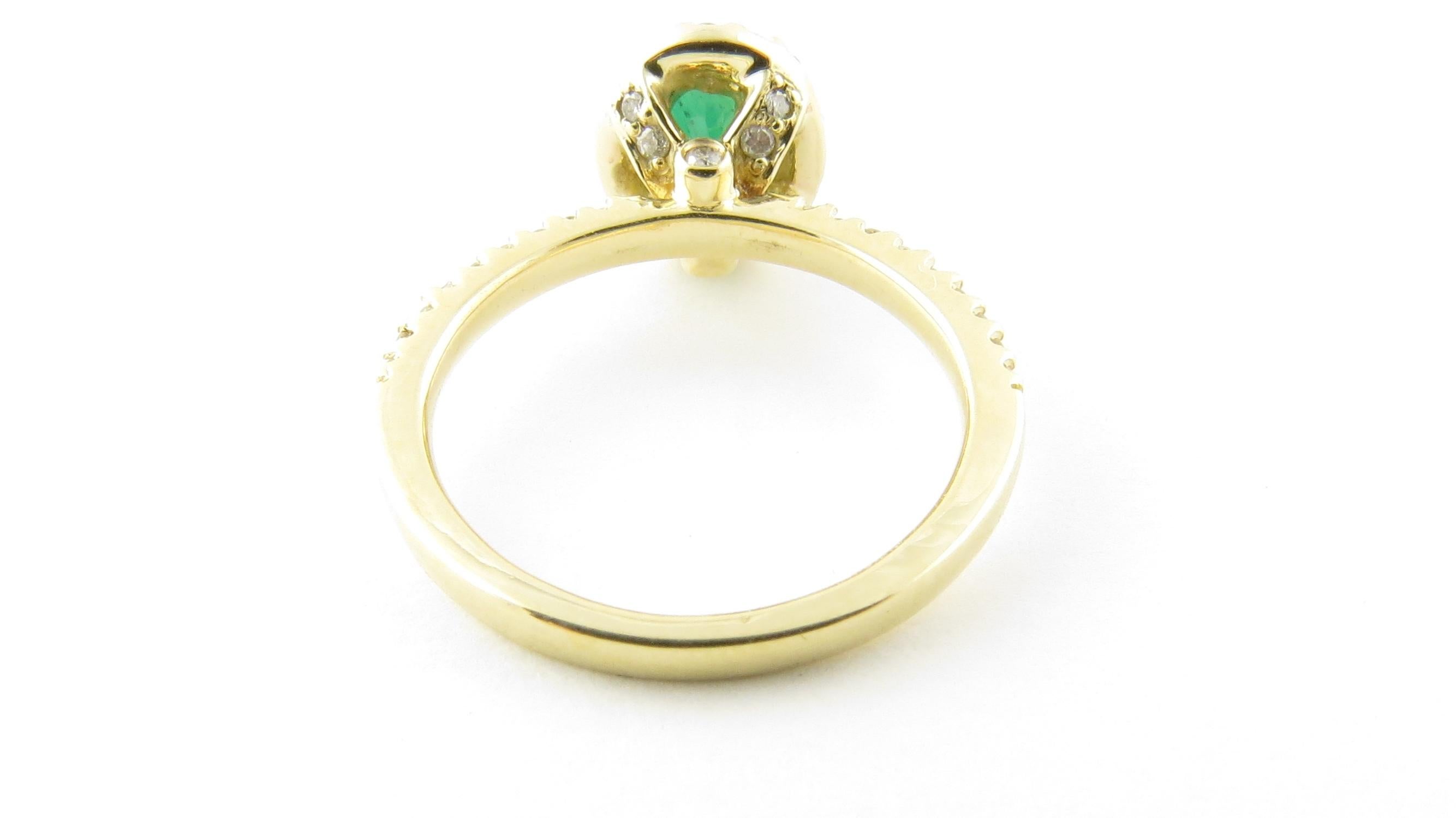 Round Cut 14 Karat Yellow Gold Emerald and Diamond Ring For Sale