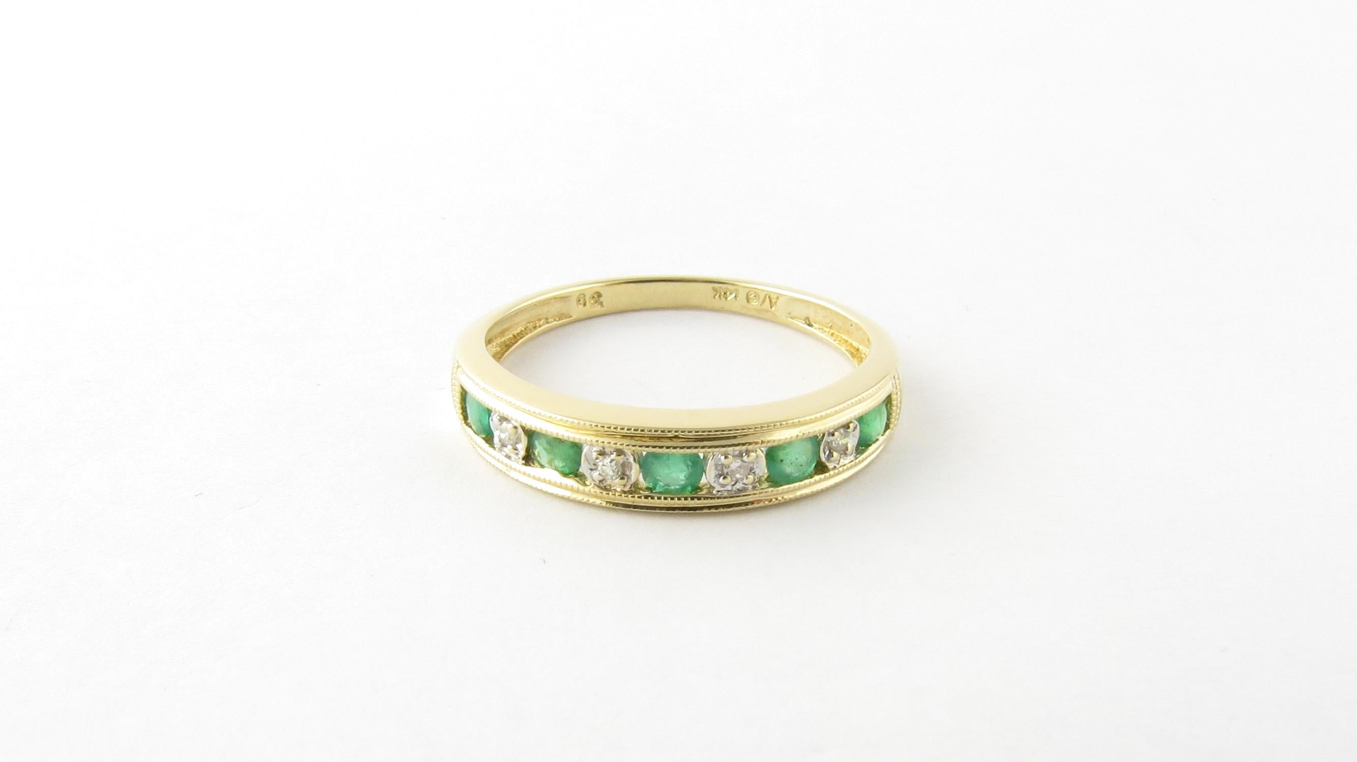 Women's 14 Karat Yellow Gold Emerald and Diamond Ring
