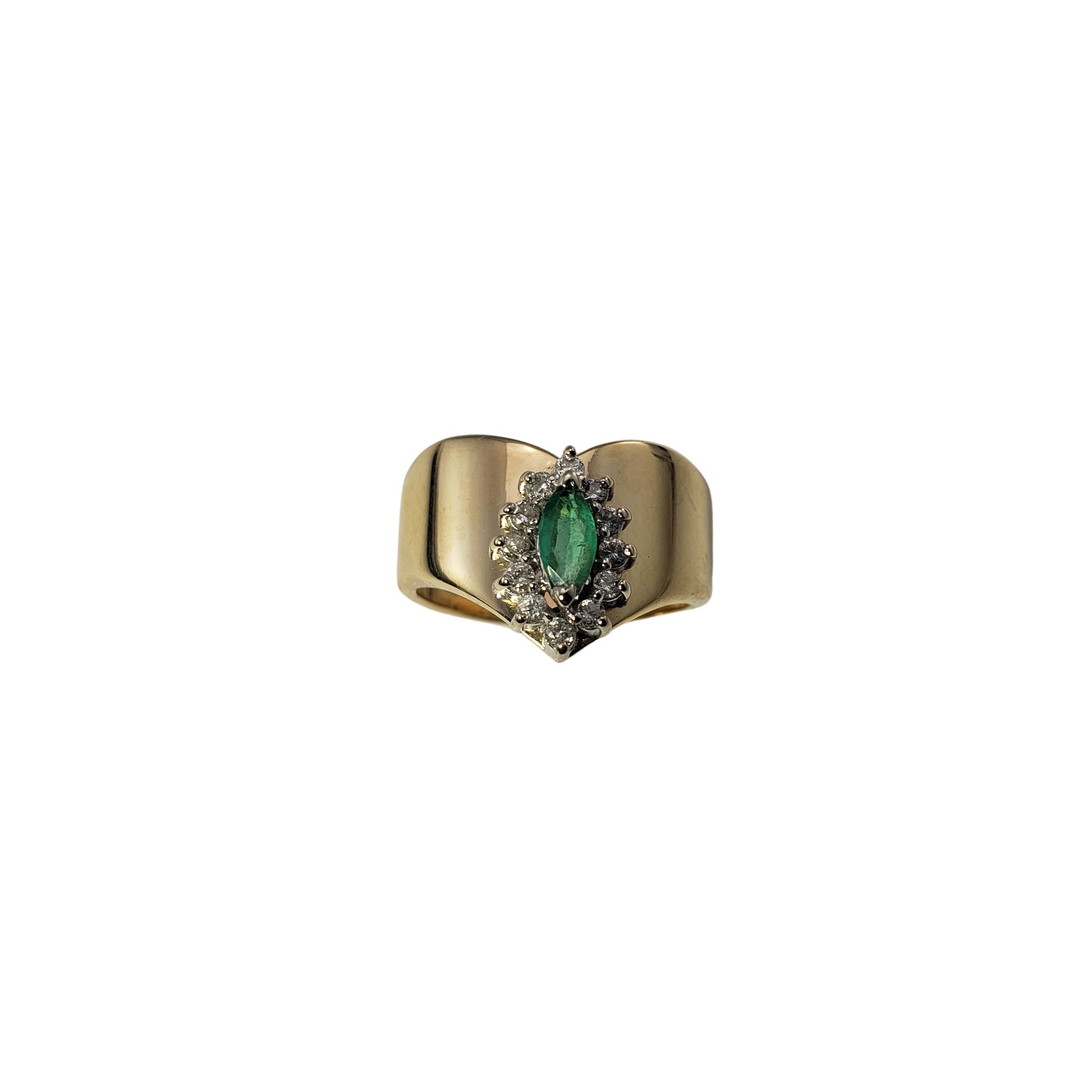 Vintage 14 Karat Yellow Gold Natural Emerald and Diamond Ring Size 8-

This lovely ring features one marquis emerald (8 mm x 4 mm) surrounded by 12 round brilliant cut diamonds set in classic 14K yellow gold. Width: 13 mm. Shank: 4 mm.

Emerald has