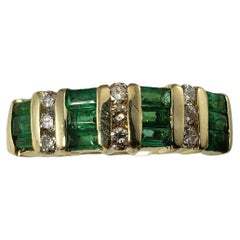 14 Karat Yellow Gold Emerald and Diamond Ring