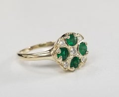 Anello in oro giallo 14 carati con smeraldo e diamante "The Cindy" in stile Art Deco