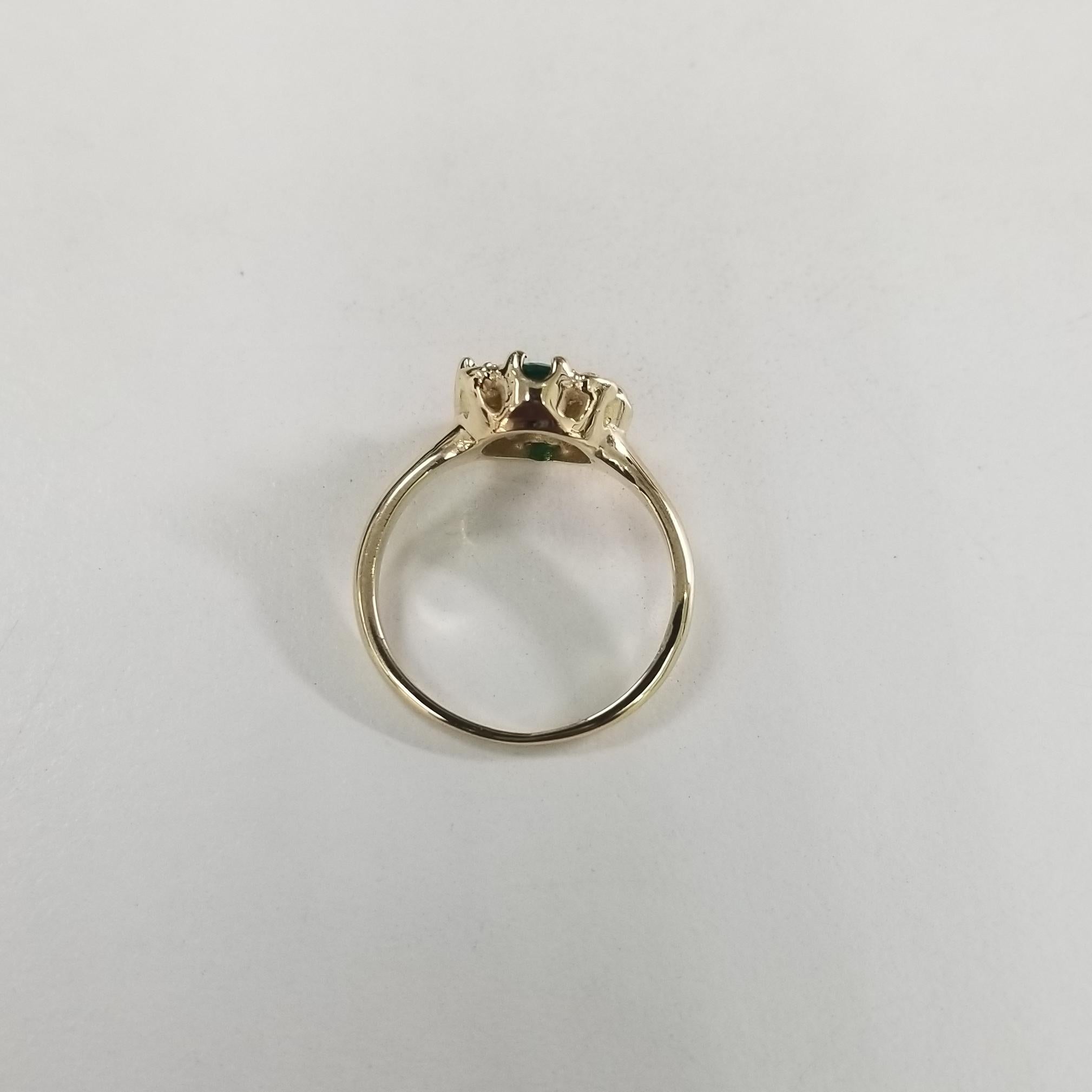 Round Cut 14 Karat Yellow Gold Emerald and Diamond Ring 