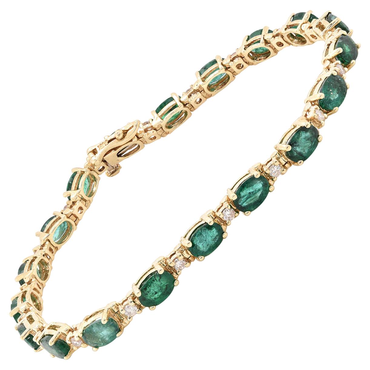 14 Karat Yellow Gold Emerald and Diamond Tennis Bracelet