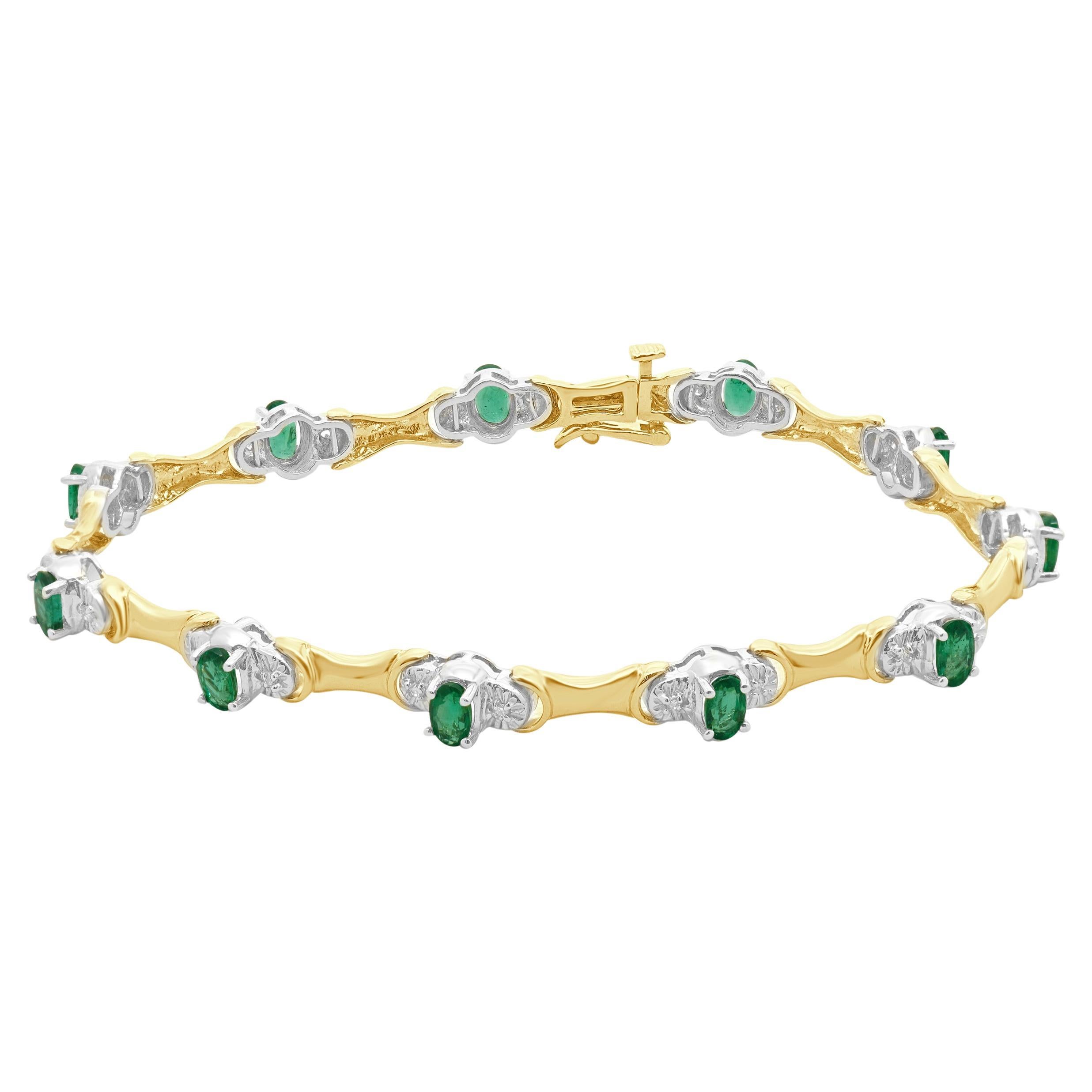 14 Karat Yellow Gold Emerald and Diamond Tennis Bracelet