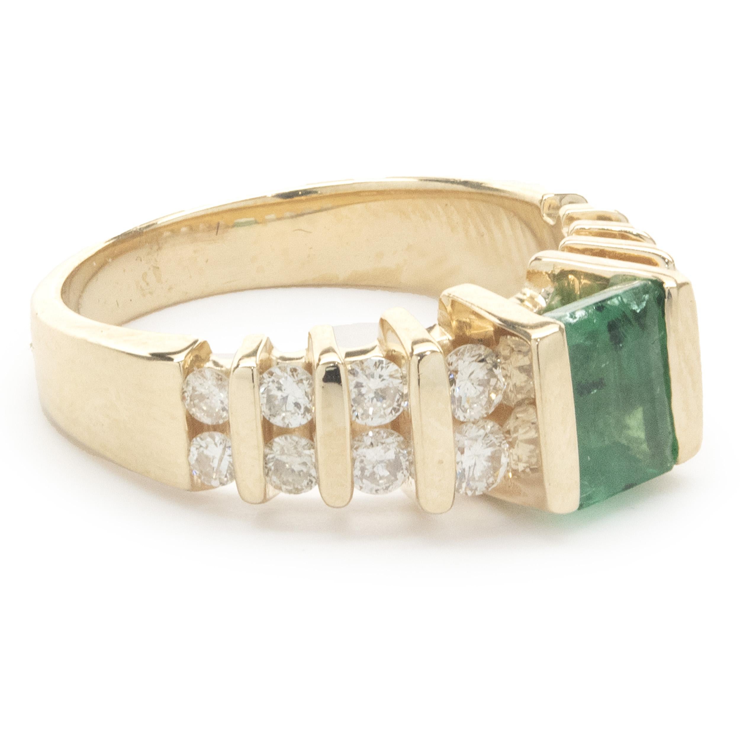 Designer: custom
Material: 14K yellow gold
Diamond: 16 round brilliant cut = 0.48cttw
Color: G
Clarity: SI1
Emerald: 1 emerald cut = 0.64ct
Dimensions: ring top measures 6.40mm wide
Ring Size: 5 (complimentary sizing available)
Weight: 4.74 grams