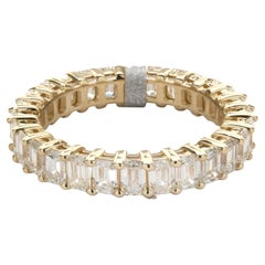14 Karat Yellow Gold Emerald Cut Diamond Eternity Band