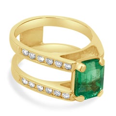 14 Karat Yellow Gold Emerald Cut Emerald with Diamonds Ring