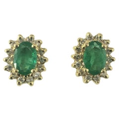 Pendientes de oro amarillo de 14 quilates con esmeralda y halo de diamantes  #19463