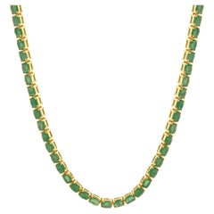 Collier en or jaune 14 carats avec émeraudes