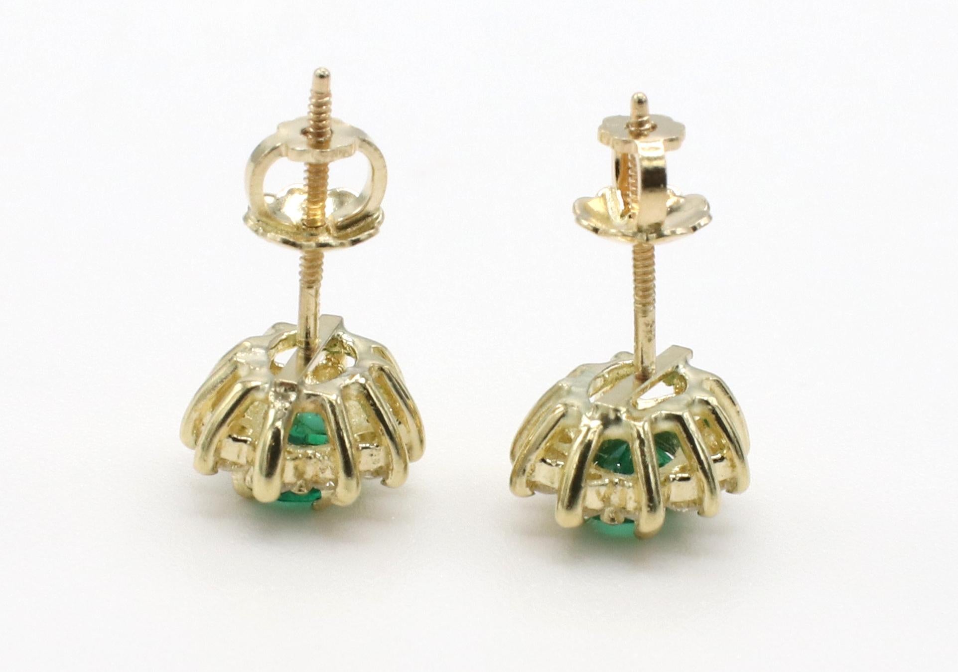 Oval Cut 14 Karat Yellow Gold Emerald & Natural Diamond Halo Stud Earrings 