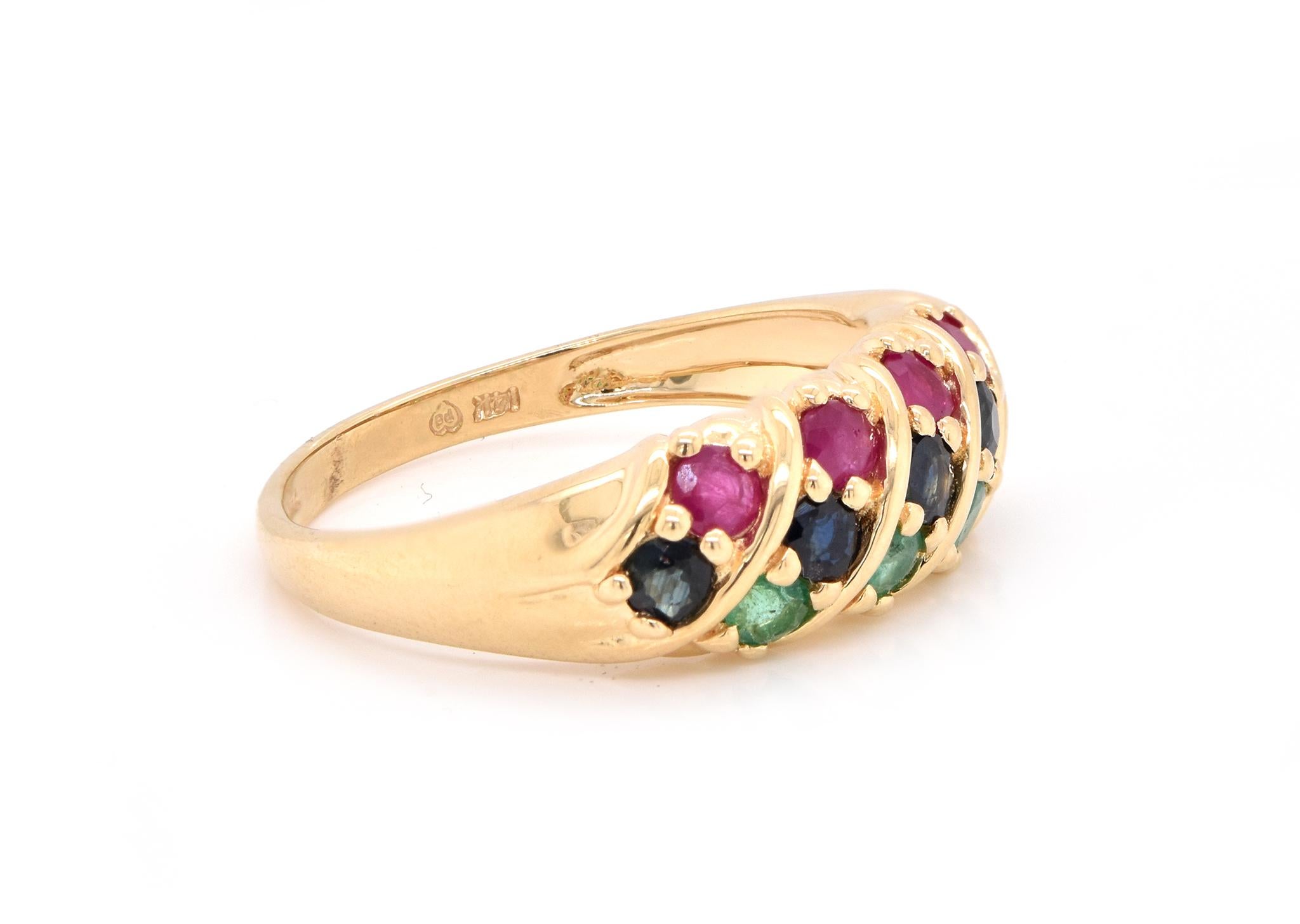 Material: 14K yellow gold 
Sapphire: 5 round cut = .35cttw
Emerald: 4 round cut = .20cttw
Ruby: 4 round cut = .35cttw
Ring Size: 10 (please allow up to 2 additional business days for sizing requests)
Dimensions: ring top measures 9.11mm wide
Weight: