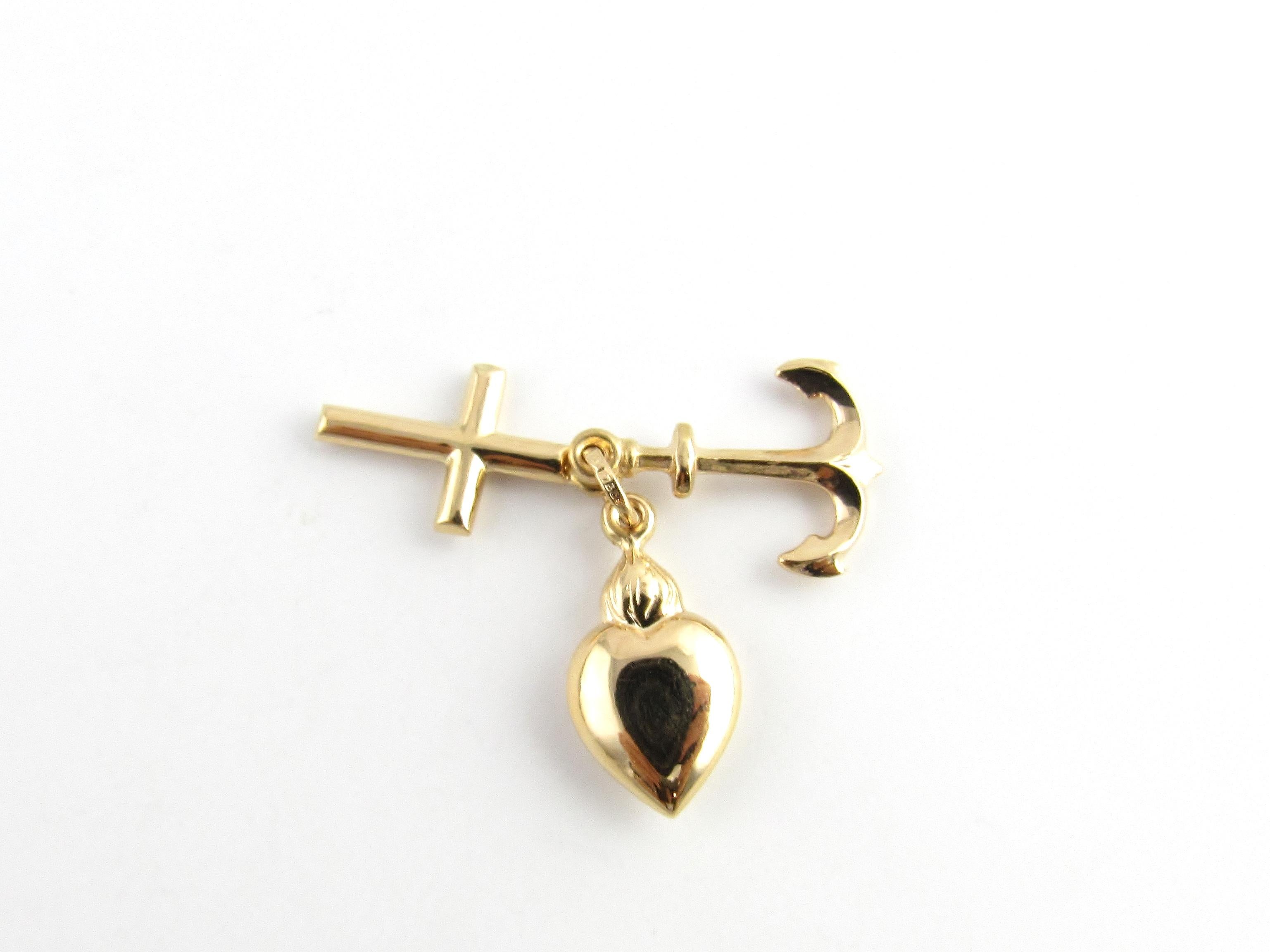 Vintage 14 Karat Yellow Gold Faith, Hope and Charity Charm

This lovely charm features a cross, an anchor and a heart; the worldwide symbols for faith, hope and charity. Beautifully detailed in 14K yellow gold.

Size: Cross: 18 mm x 10 mm 
Anchor: