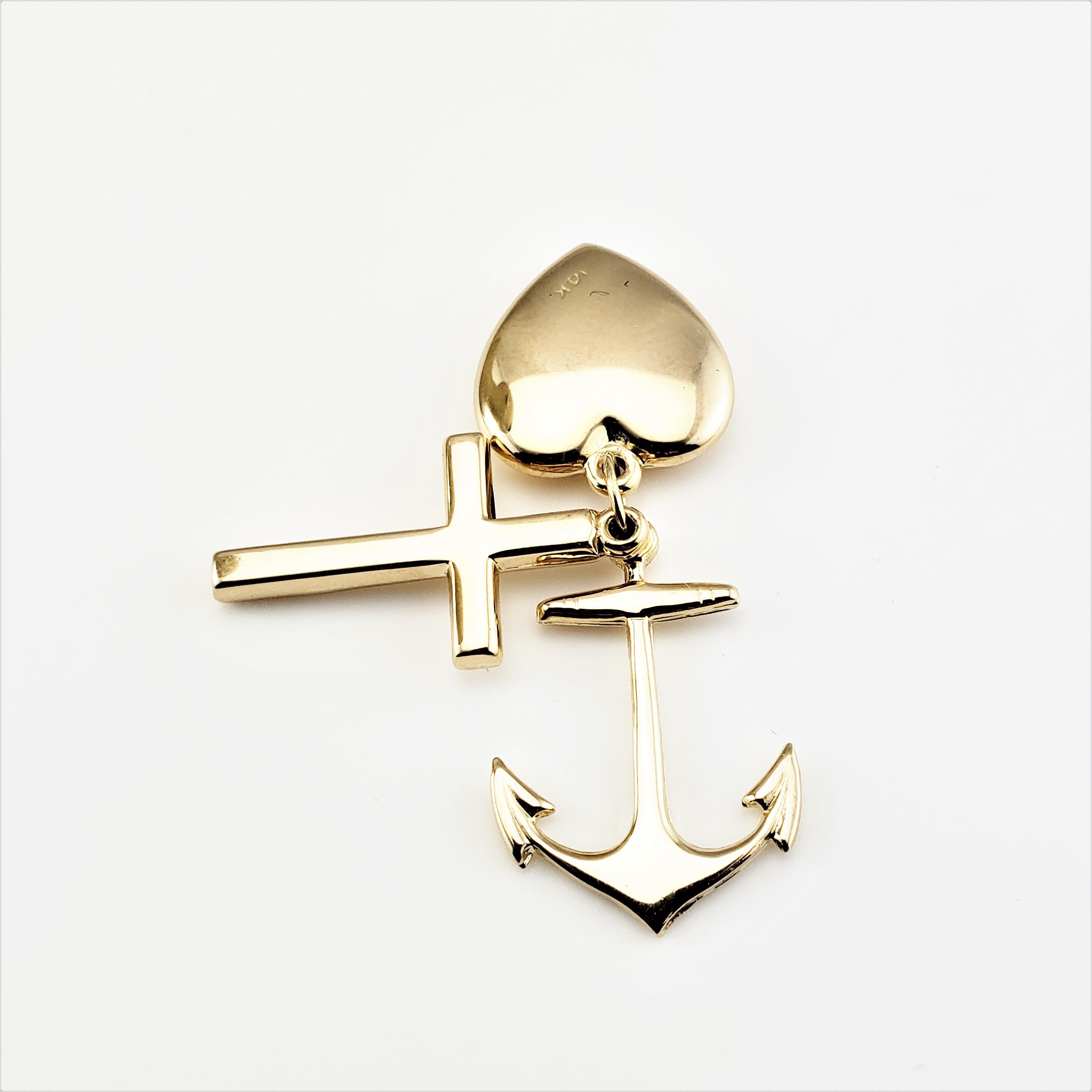 14 Karat Yellow Gold Faith, Hope and Charity Charm-

This lovely charm features a cross, anchor and heart; the universal symbols for faith, hope and charity.  Beautifully detailed in 14K yellow gold.

*Chain not included

Size:  25 mm x  14 mm