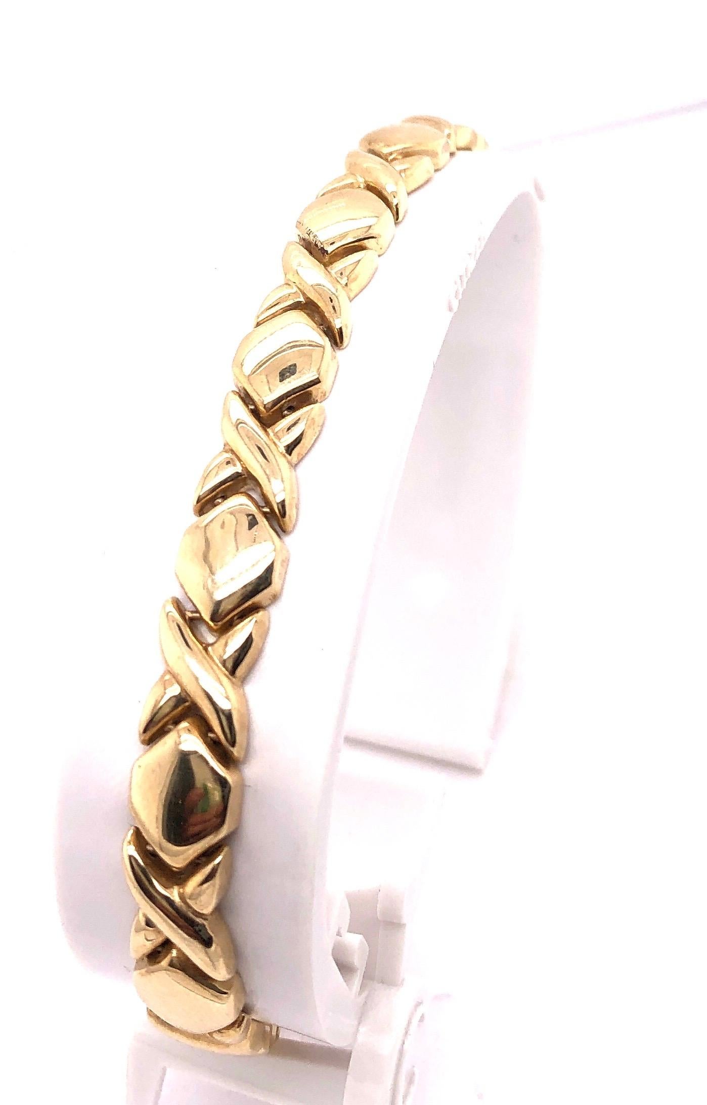 bracelet en or jaune 14 carats à maillons fantaisie de 7 pouces.
7mm de large
poids total de 11 grammes.