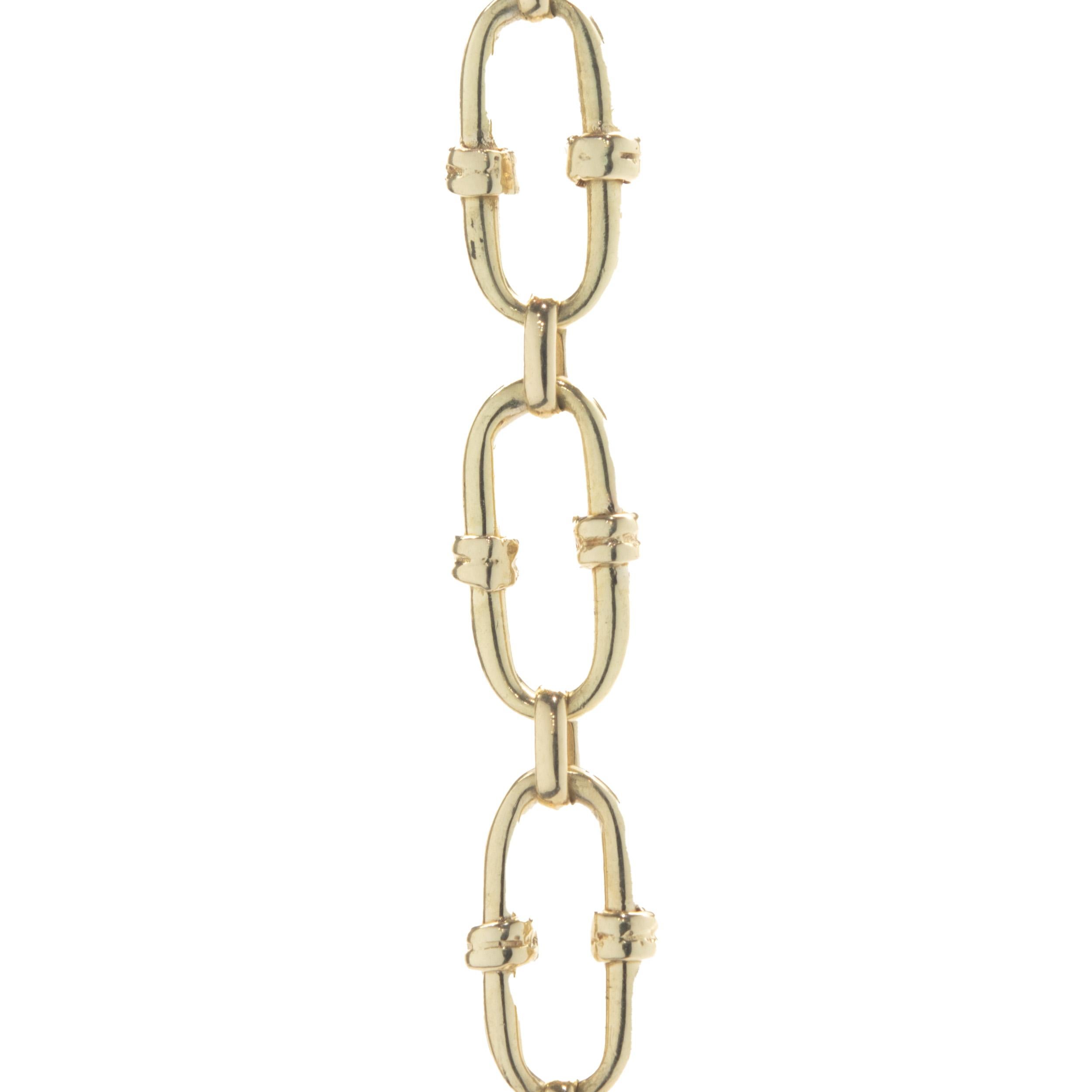 Material: 14K yellow gold
Dimensions: bracelet will fit up to a 7.5-inch wrist 
Weight: 10.20 grams