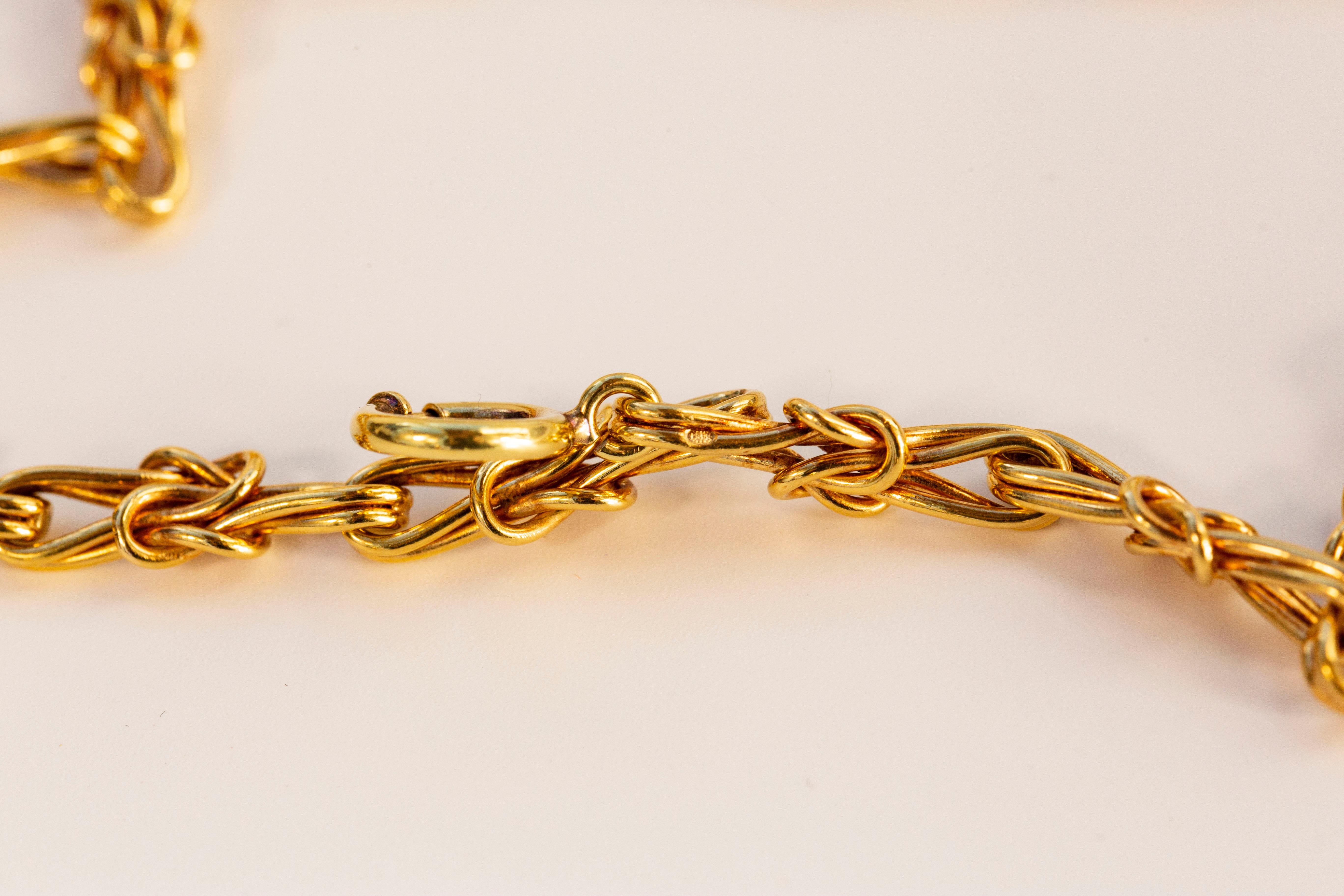 14 Karat Yellow Gold Fancy Link Necklace with Stylized Buttons and Loop Motifs For Sale 2