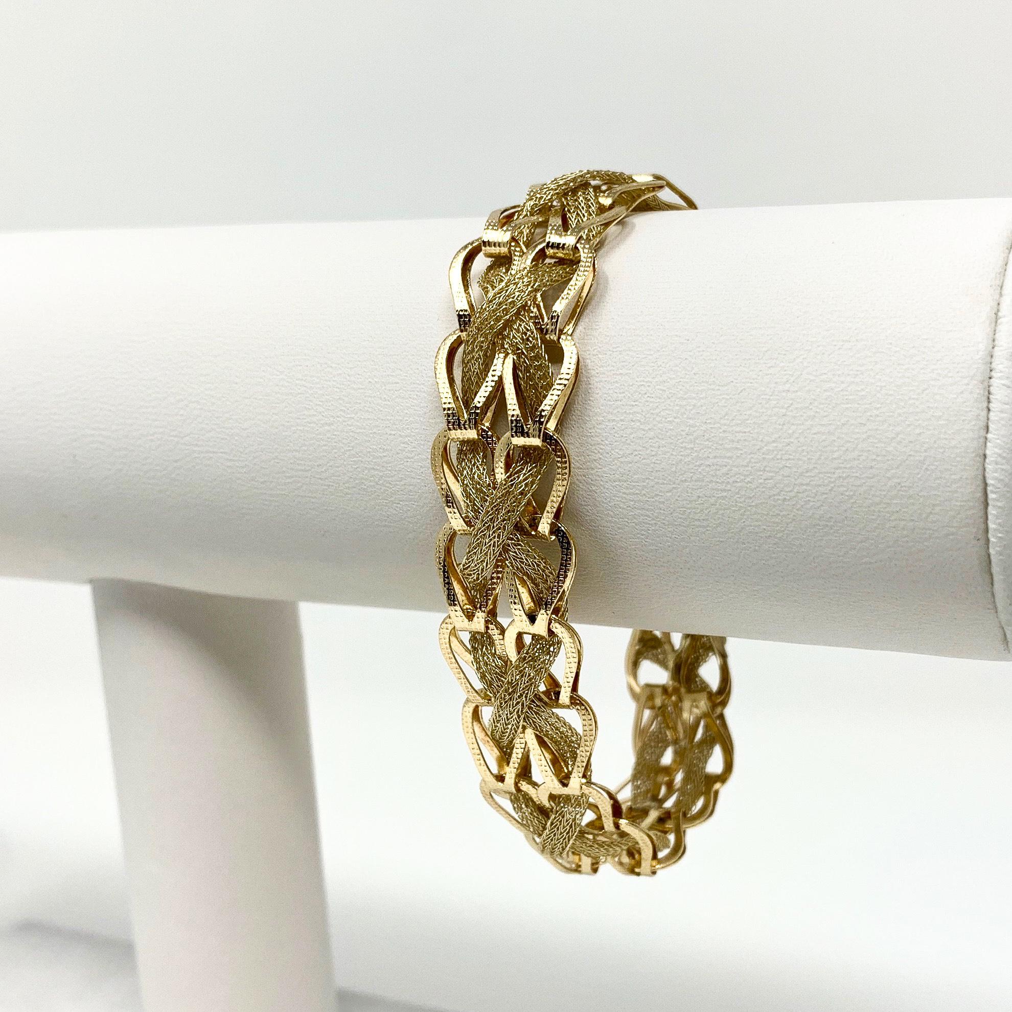 14k Yellow Gold 14.4g Fancy Mesh Weave 13mm Link Bracelet 7 Inches

Condition:  Excellent (Professionally Cleaned and Polished)
Metal:  14k Gold (Marked, and Professionally Tested)
Weight:  14.4g
Length:  7 Inches
Width:  13mm 
Closure:  Box Tab