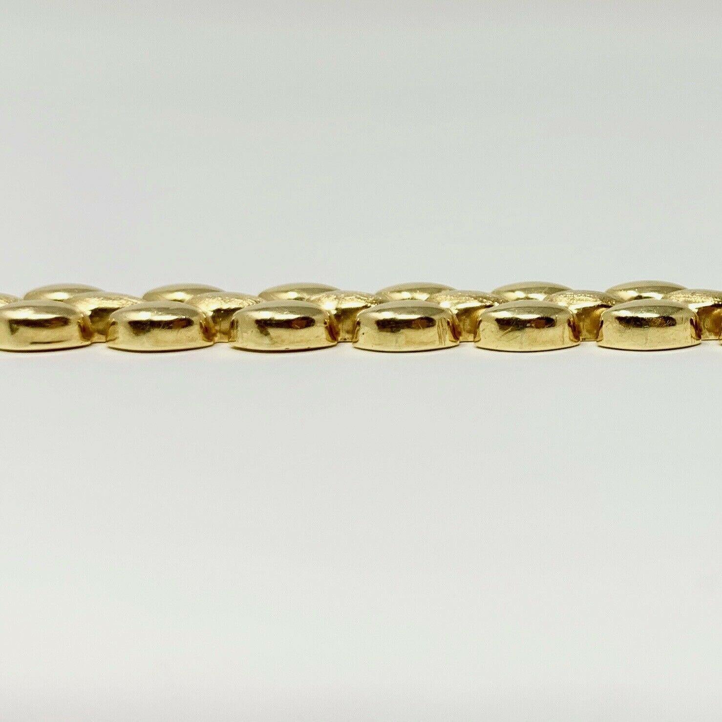 Women's 14 Karat Yellow Gold Fancy Panther Link Bracelet