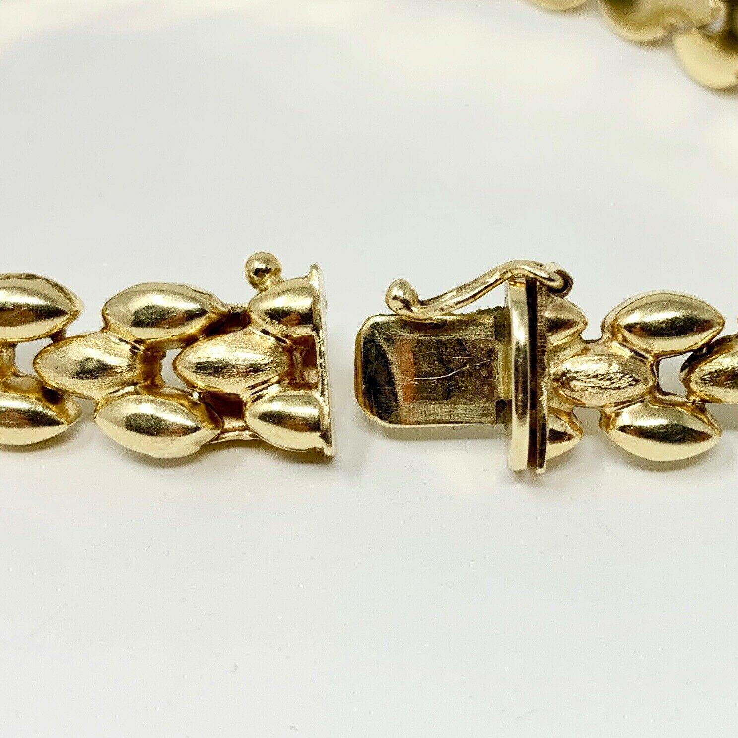 14 Karat Yellow Gold Fancy Panther Link Bracelet 1