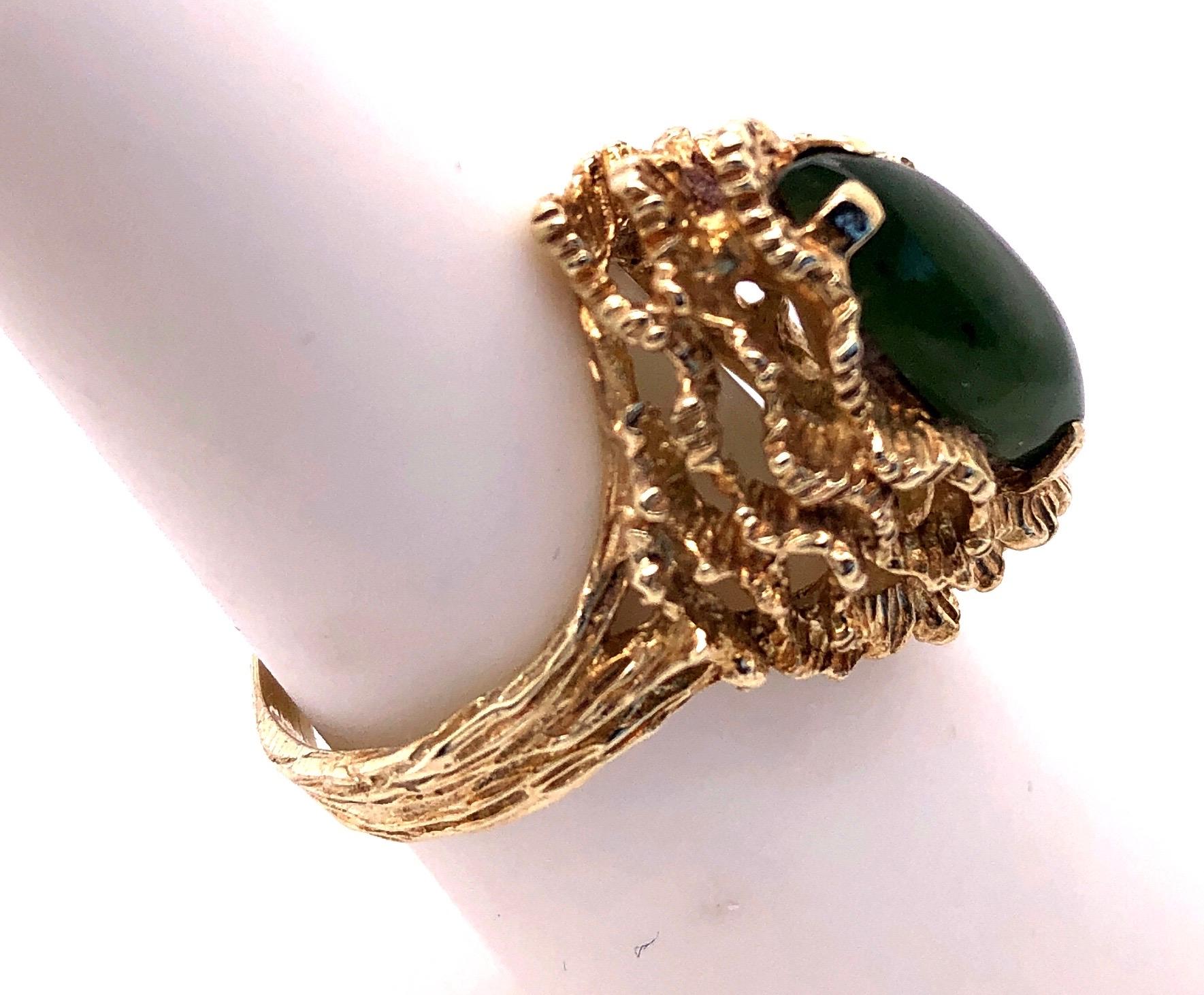 14 Karat Yellow Gold Fashion Jade Ring Size 6.5.
8.6 grams total weight.