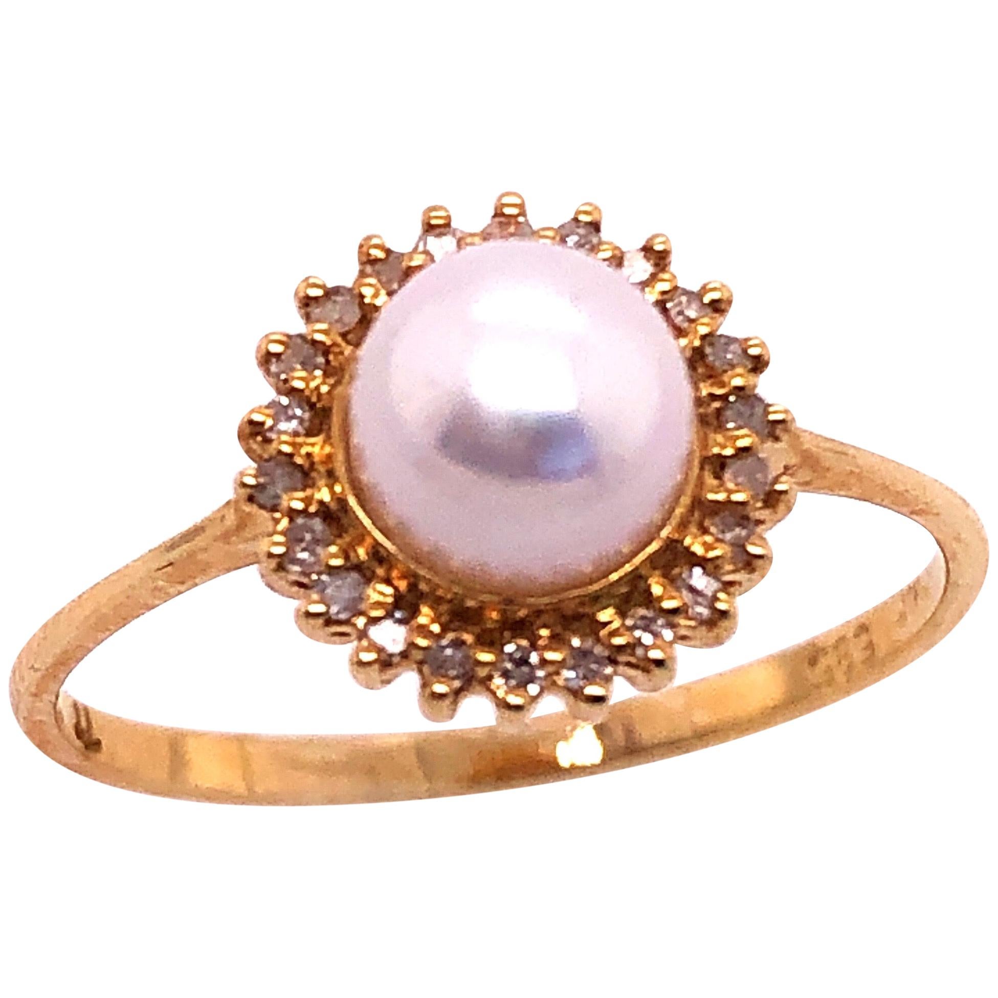 14 Karat Yellow Gold Fashion Pearl Ring with Diamonds For Sale